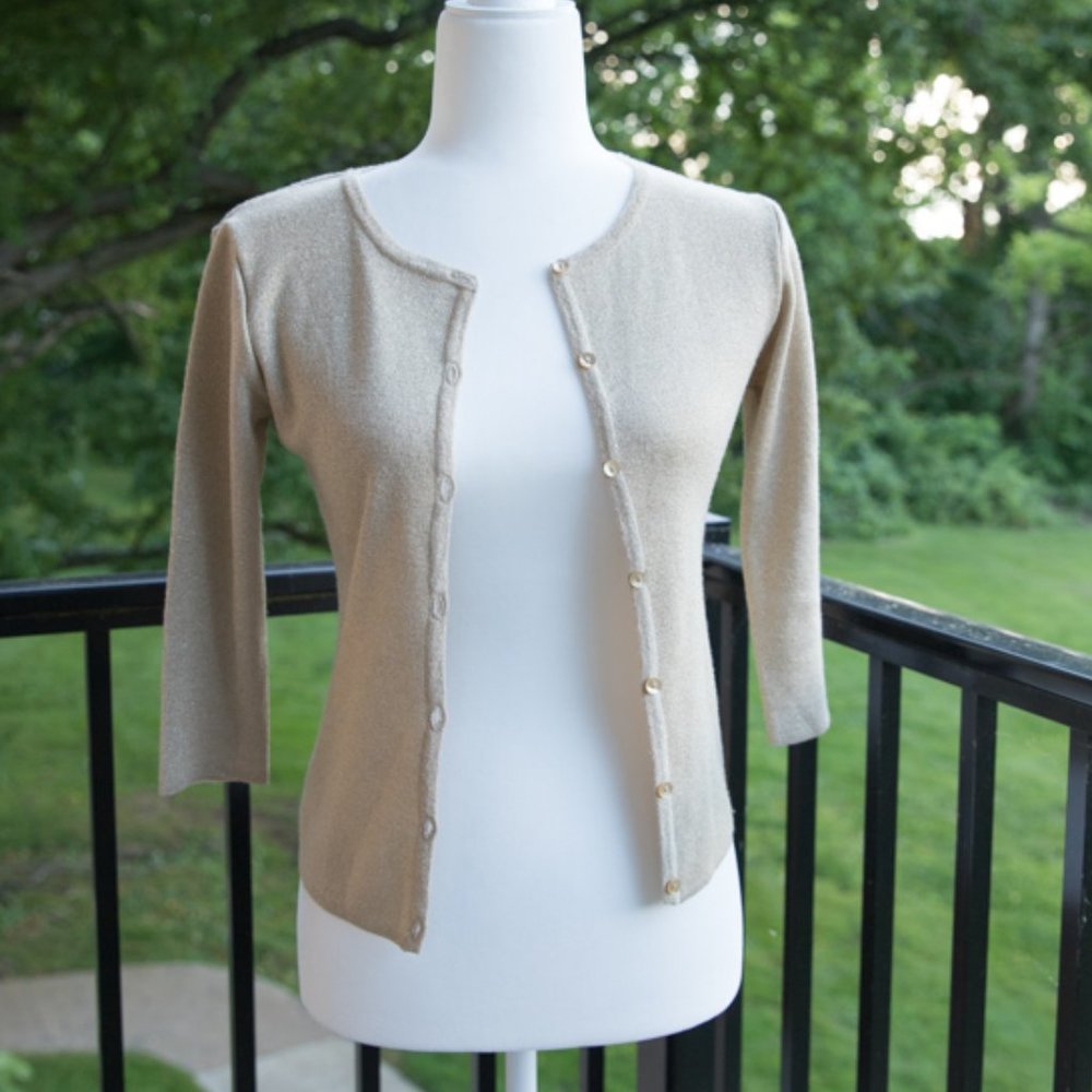 Gold cardigan, size M.